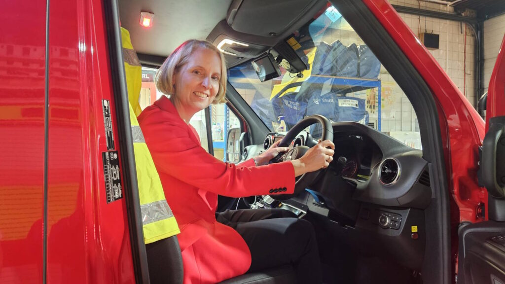 Emma Reynolds MP in driver's seat of fire engine