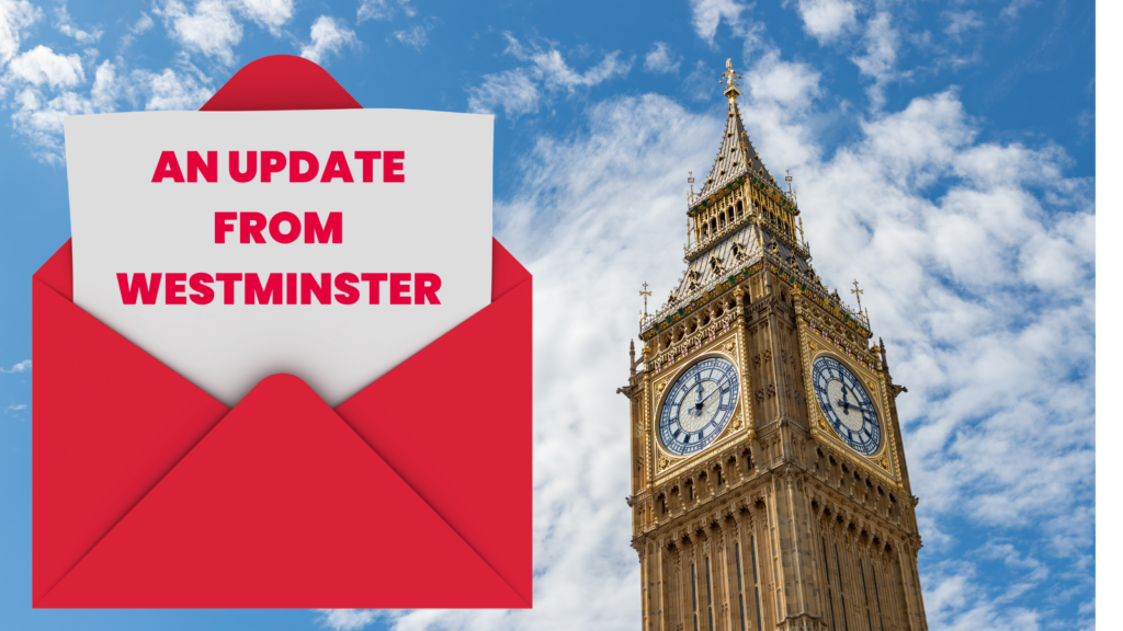 A photo of Big Ben with red envelope next to it.