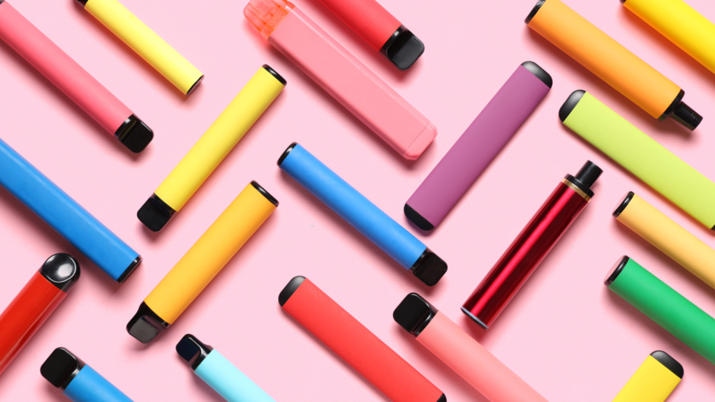 A mix of colourful disposable vapes.
